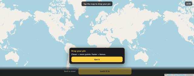A world map with a pin-drop prompt